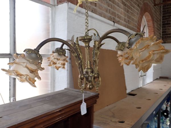 A FRENCH BRASS FOUR BRANCH CHANDELIER
