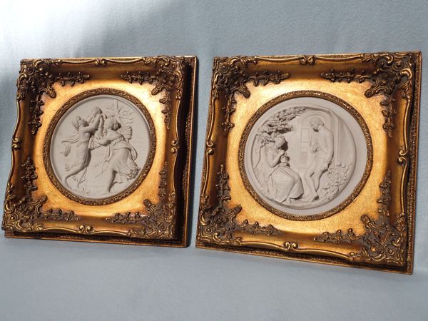A PAIR OF REPRODUCTION RECONSTITUTED MARBLE RELIEF PLAQUES