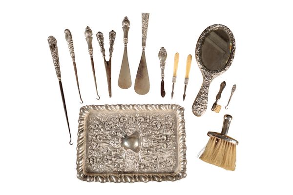 A MATCHED SILVER DRESSING SET