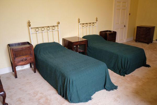 A PAIR OF PAINTED CAST METAL SINGLE BEDS