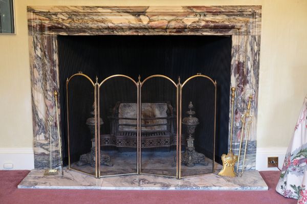 A BRASS FOUR-FOLD FIRE SCREEN