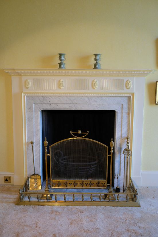 AN UNUSUAL CAST IRON FIRE BASKET