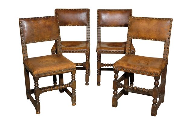 A SET OF CROMWELLIAN STYLE OAK DINING CHAIRS