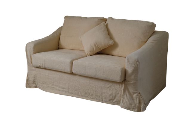 A CONTEMPORARY CREAM UPHOLSTERED SOFA BED