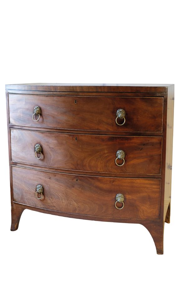 A LATE REGENCY TALL MAHOGANY BOW FRONT CHEST,