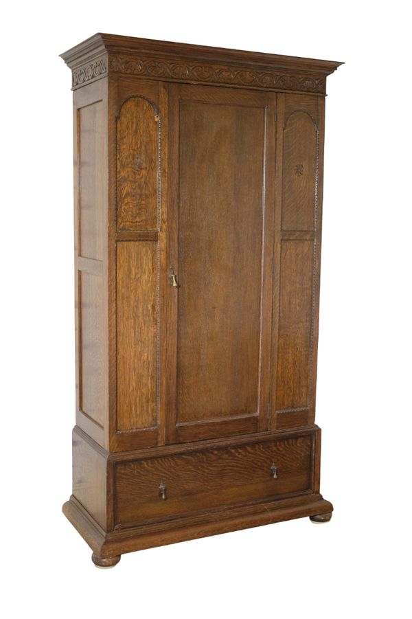 AN ARTS AND CRAFTS OAK SINGLE WARDROBE,