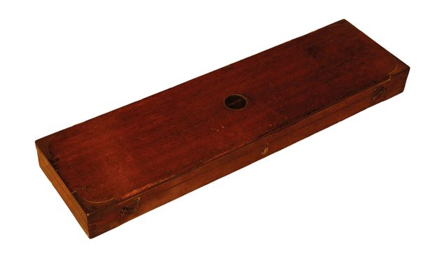 A MAHOGANY AND BRASS BOUND GUN CASE