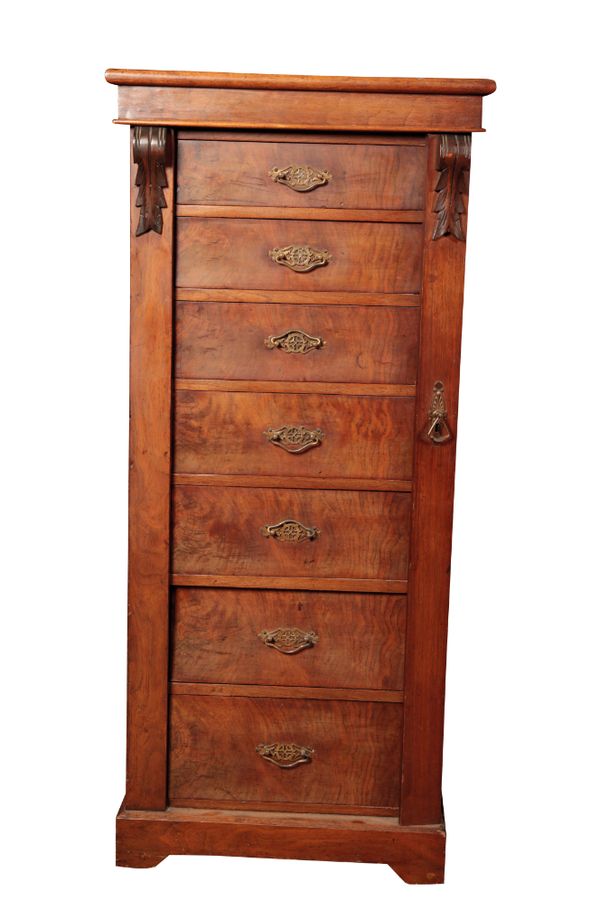 A LATE VICTORIAN WALNUT WELLINGTON CHEST,