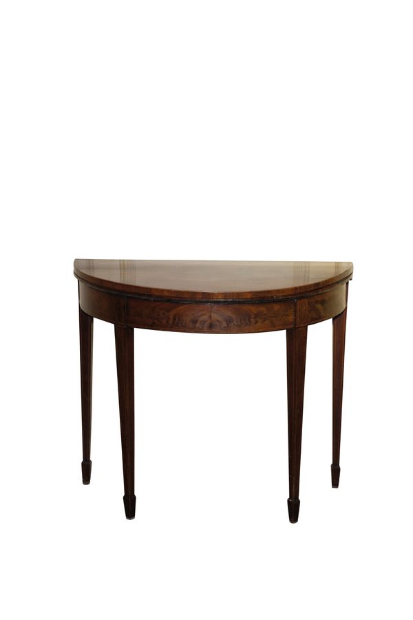 A GEORGE III MAHOGANY SHERATON STYLE "D"-SHAPED CARD TABLE