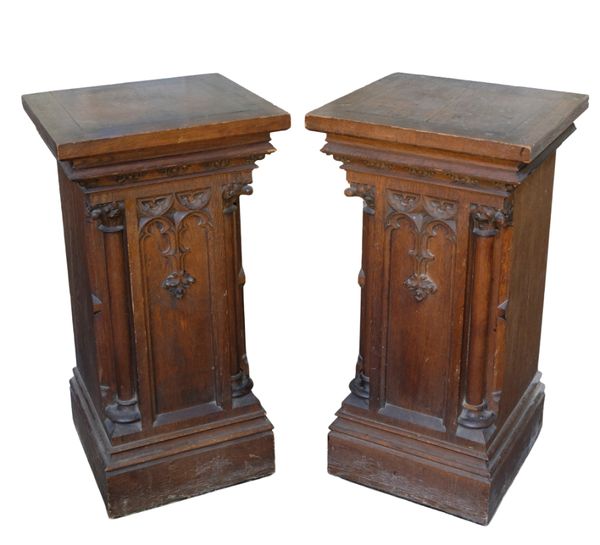 A PAIR OF OAK GOTHIC REVIVAL PEDESTALS