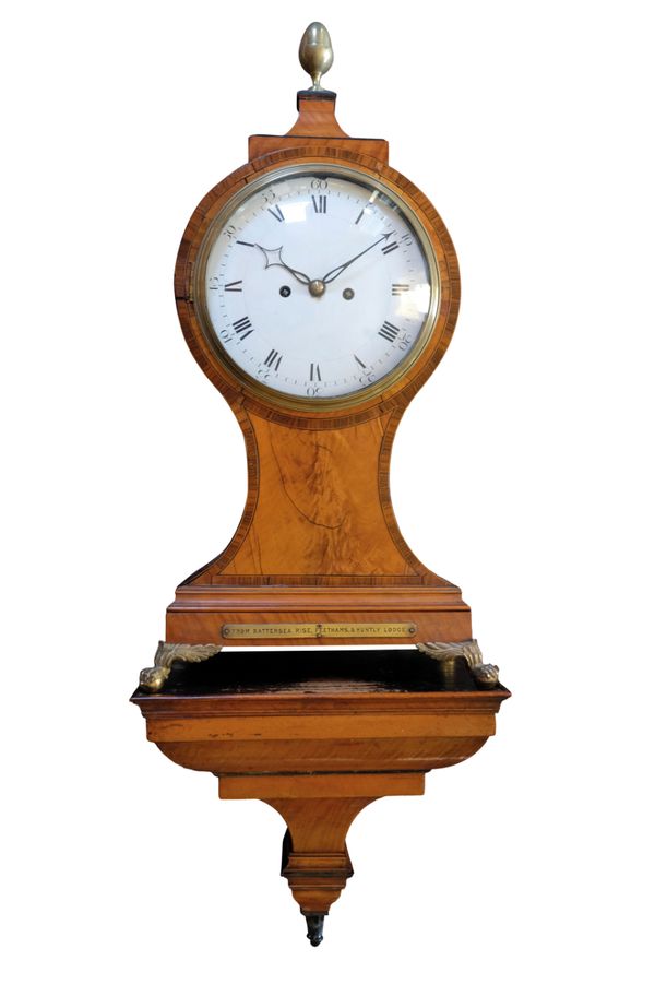 A FINE GEORGE III SATINWOOD BALLOON-SHAPED BRACKET CLOCK