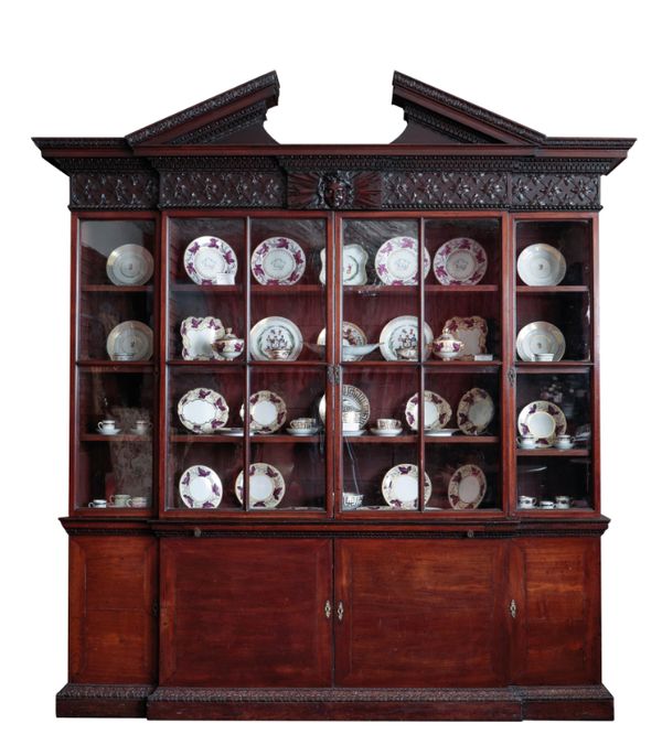 A GEORGE II MAHOGANY BREAK-FRONT LIBRARY BOOKCASE