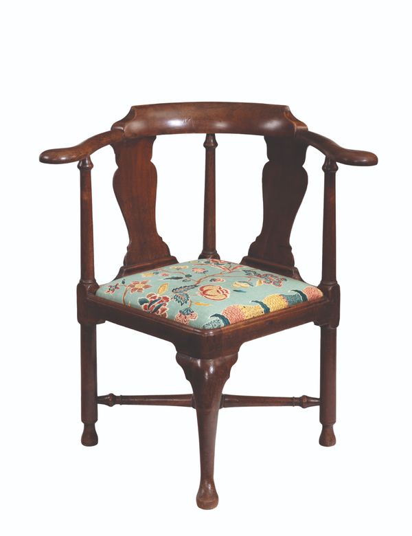 A GEORGE II WALNUT CORNER CHAIR