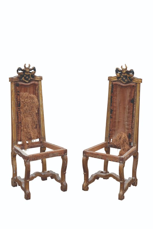 A PAIR OF BAROQUE GILTWOOD SIDE CHAIRS,