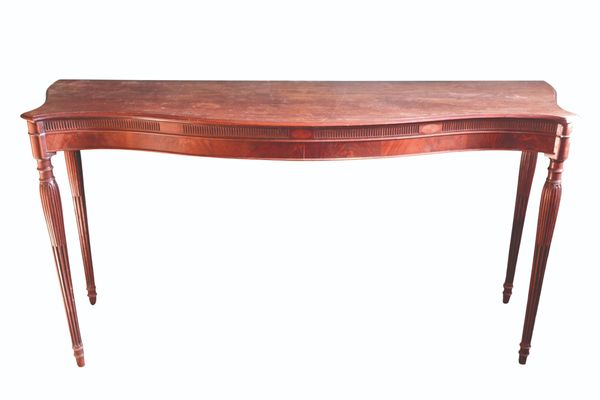 AN IMPORTANT GEORGE III SERPENTINE MAHOGANY SIDE TABLE