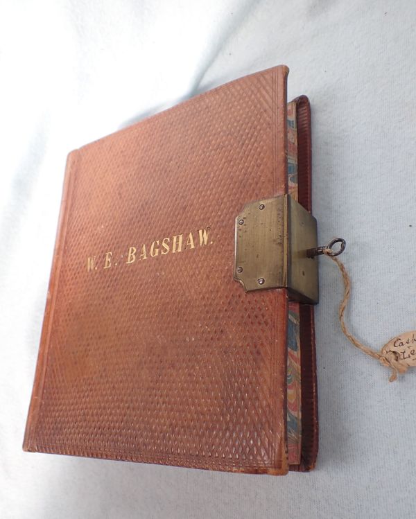 A 19TH CENTURY  LEATHERBOUND LOCKABLE (KEY PRESENT)  ACCOUNTS LEDGER