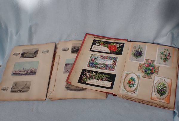 A VICTORIAN SCRAP BOOK CONTAINING MANY CHRISTMAS CARDS