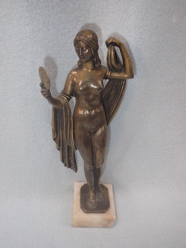 AN ART DECO BRONZE STUDY OF A NUDE WOMAN