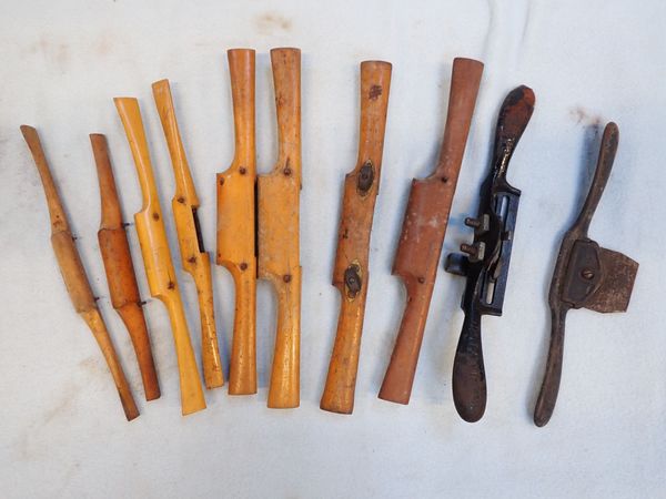 A COLLECTION OF WOODWORKING SPOKE SHAVES