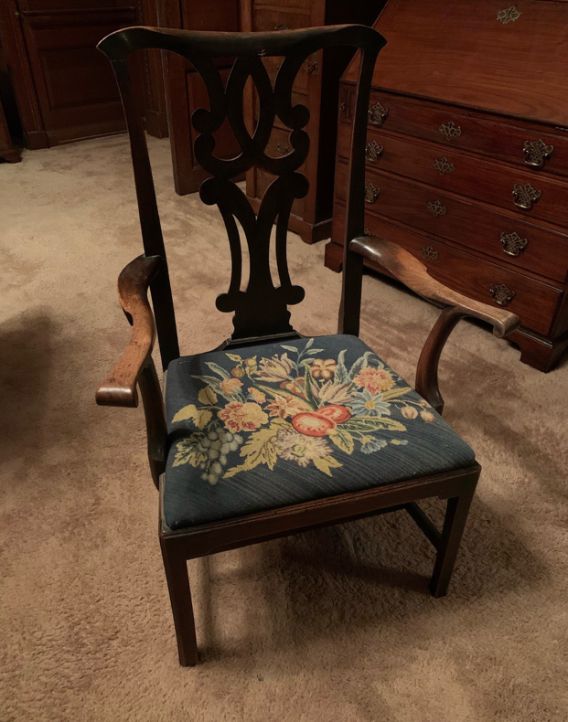 A GEORGE III FRUITWOOD ELBOW CHAIR