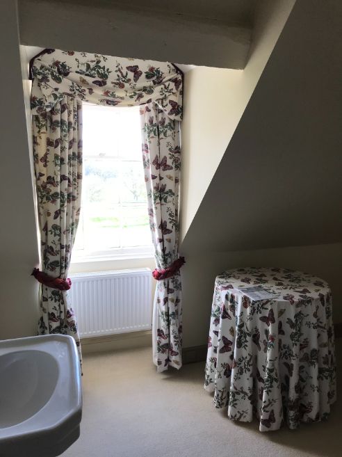 A SET OF CURTAINS PRINTED WITH BUTTERFLY AND FLORA,