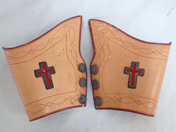 A PAIR OF CONTINENTAL ECLESIASTICAL LEATHER VESTMENT CUFFS