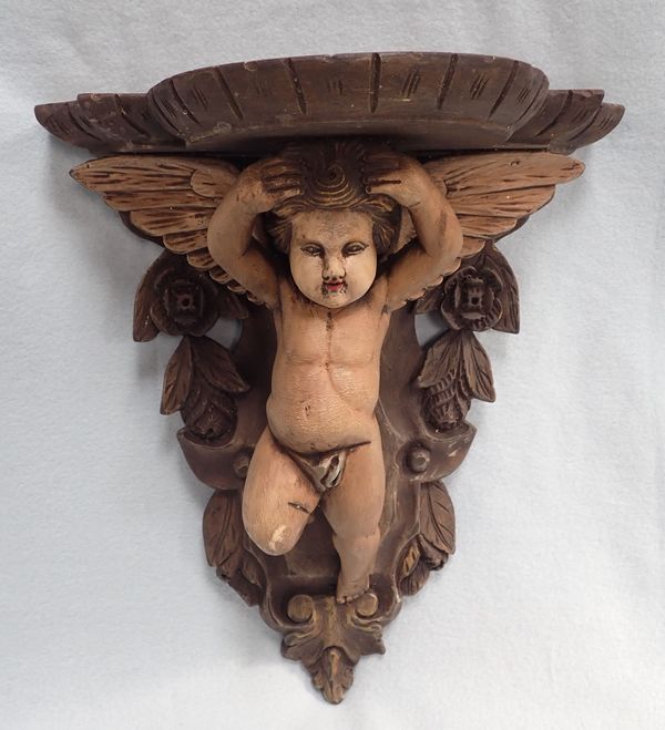 A BAVARIAN BAROQUE STYLE CARVED WOODEN BRACKET
