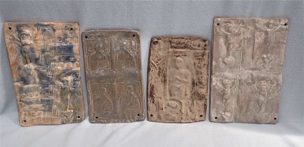 FOUR CERAMIC RELIEF SCULPTURES