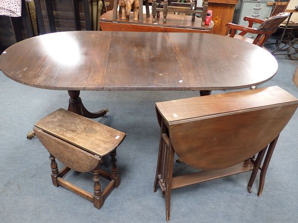 AN EDWARDIAN MAHOGANY SUTHERLAND TABLE