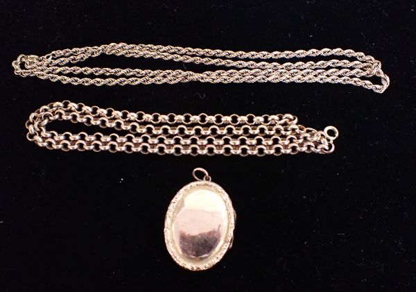 A 9CT GOLD LOCKET AND CHAIN