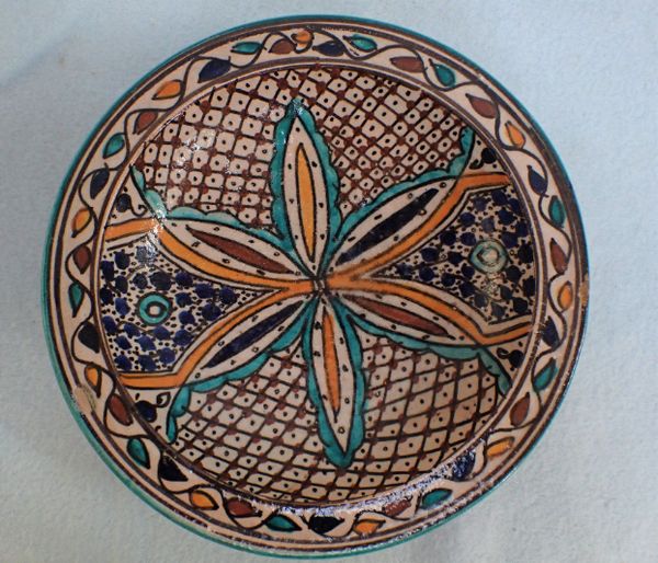 AN EASTERN GLAZED BOWL