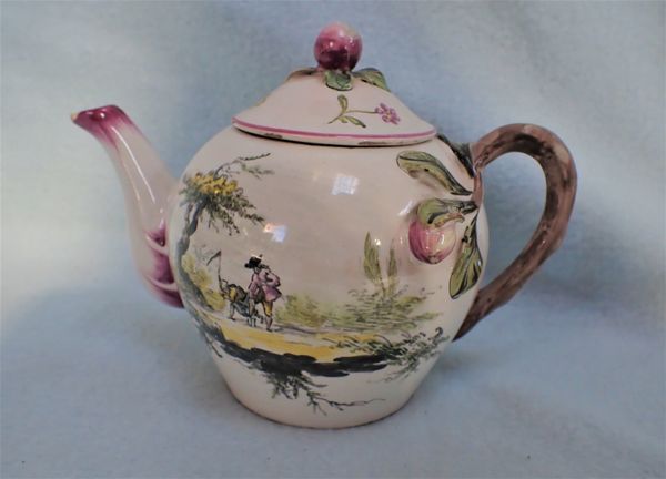 A FRENCH FAIENCE TEAPOT