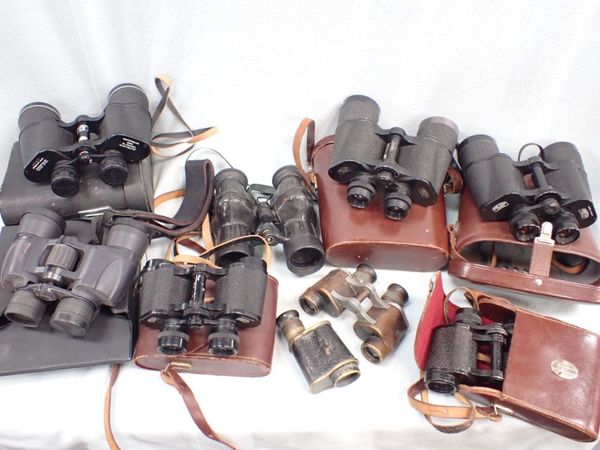 A COLLECTION OF BINOCULARS