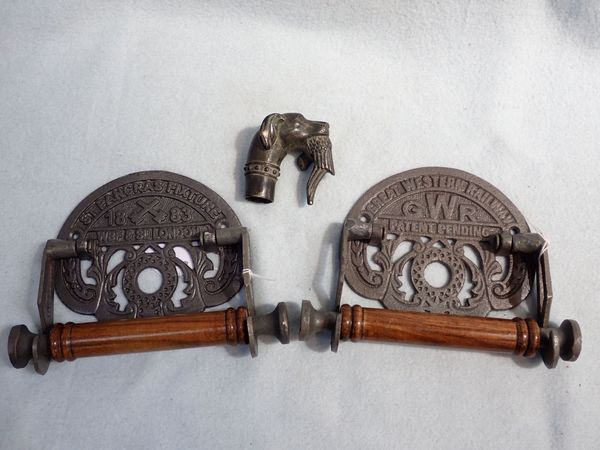 TWO RAILWAY CAST IRON TOILET ROLL HOLDERS