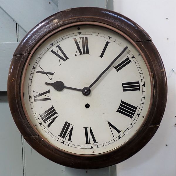 AN EARLY 20TH CENTURY OAK-CASED DIAL CLOCK