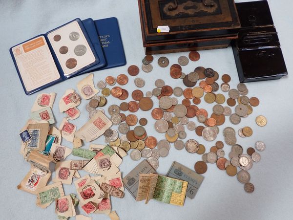 A QUANTITY OF COINS AND STAMPS