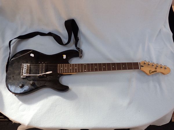 AN 'ENCORE' ELECTRIC GUITAR