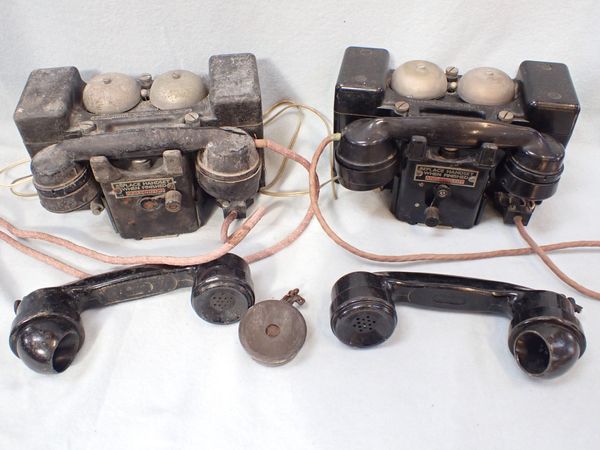 A PAIR OF MILITARY FIELD TELEPHONES