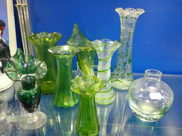 A COLLECTION OF EDWARDIAN GREEN GLASS VASES