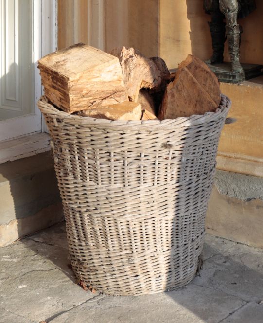 A PAIR OF LARGE WICKER LOG BASKETS,