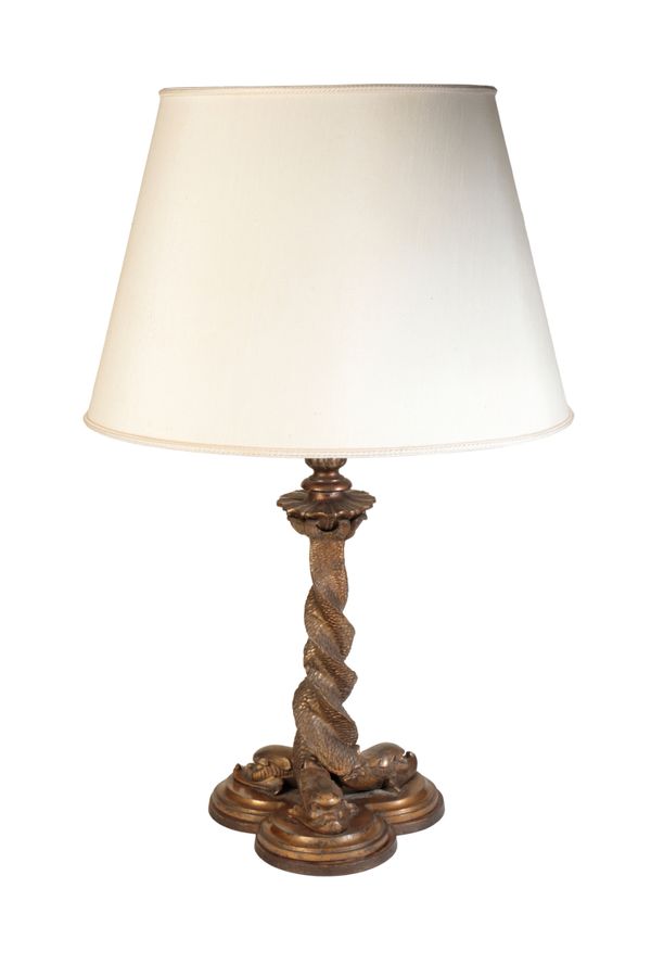 A GILT METAL TABLE LAMP CAST AS THREE ADORSED DOLPHINS,