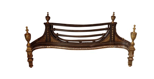 A WROUGHT IRON, CAST IRON AND BRASS MOUNTED FIREGRATE IN GEORGE III STYLE,