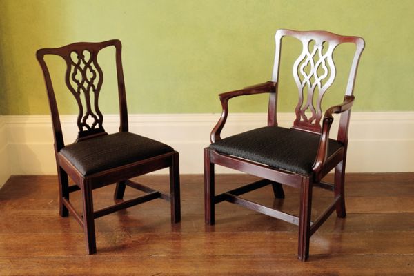 A COMPOSED SET OF SIXTEEN GEORGE III MAHOGANY DINING CHAIRS, SOME POSSIBLY BY GILLOWS,