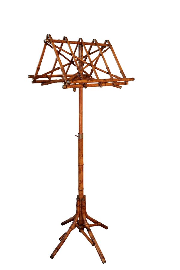 A BAMBOO AND BRASS MOUNTED DUET STAND,