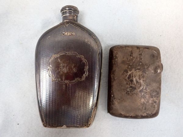 A SILVER HIP FLASK