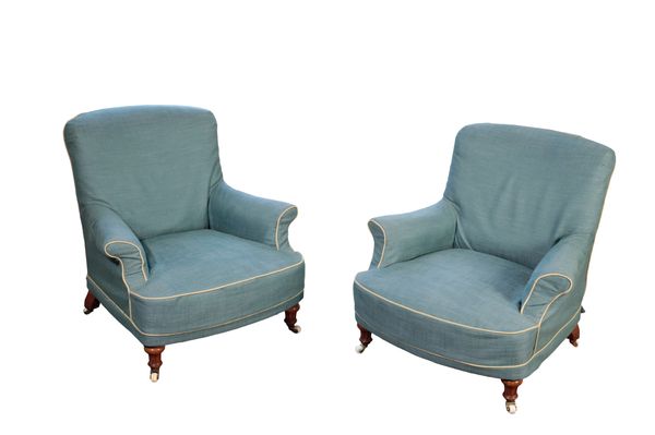A PAIR OF VICTORIAN UPHOLSTERED ARMCHAIRS, IN THE MANNER OF HOWARD & SONS AND POSSIBLY BY GILLOWS,