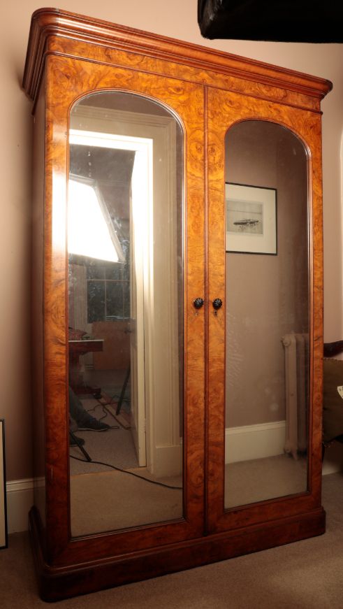 A VICTORIAN WALNUT WARDROBE, BY GILLOWS,