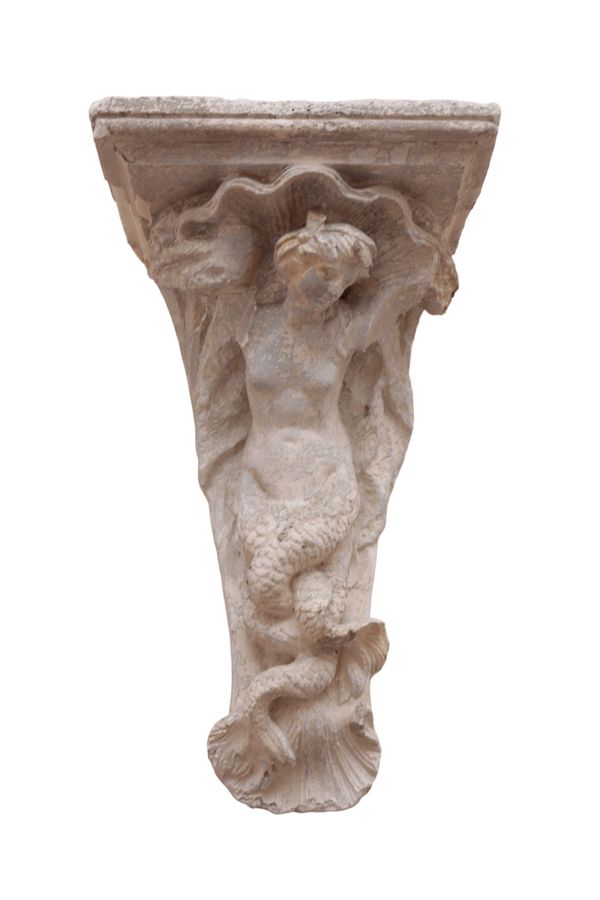 A PAINTED PLASTER WALL BRACKET MODELLED AS A TRITON,