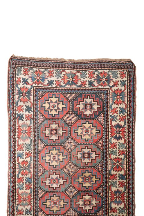 A SHIRVAN TYPE RUG,