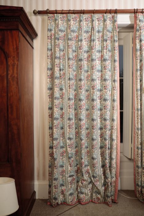 A PAIR OF PRINTED COTTON CURTAINS,